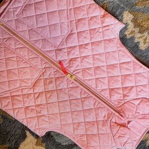 Stylish quilted featuring a gold zipper jacket